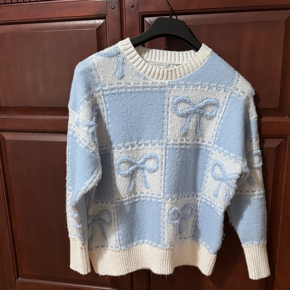 Altar'd State Light Blue and Cream Bow Sweater